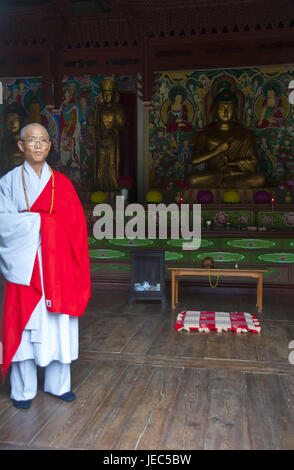 Old monk in the Buddhist Pohyon temple in the mountain Myohyang-san, North Korea, Stock Photo