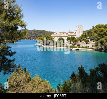 The Benedictine monastery on tiny St Mary's island in Veliko Jezero a sea lake on the island of Mljet in Croatia Stock Photo