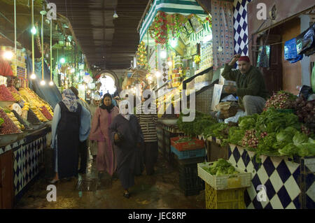 Morocco, Meknes, covered market, seller, vegetables, fruit, women, no model release, Africa, North Africa, town, locals, Moroccans, Moroccans, headscarf, traditionally, shopping, food, market, vegetable market, inside, lighting, lamps, Stock Photo