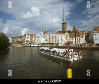 Germany, Schleswig - Holstein, Lübeck, Old Town, Marien's church, Peter's church, Obertrave, bank promenade, excursion boat, North Germany, Hanseatic town, Old Town island, town, town view, structures, steeples, towers, historically, Marien's church, Peter's church, architecture, sacred setting, church, churches, promenade, boat, round trip, place of interest, waters, cloudy sky, UNESCO-world cultural heritage, Stock Photo