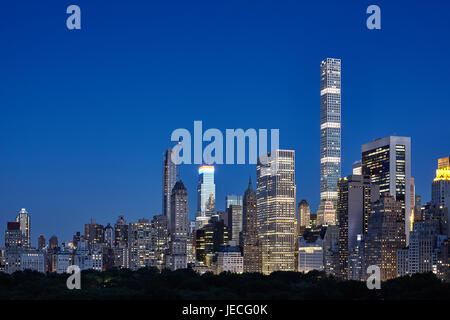 Manhattan seen over Central Park at nightfall, Upper East Side, New York City, USA. Stock Photo