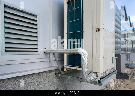 Air conditioning equipment atop a modern building Stock Photo