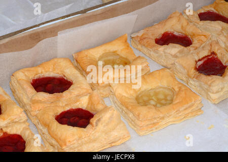 Bakery box of cherry and apple strudel pastries Stock Photo