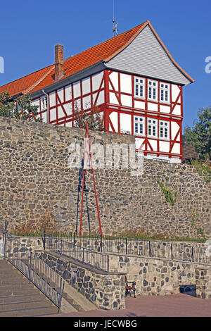 Germany, Hessen, mountain Hom, city wall, half-timbered house, Stelzenmann, sky, blue, Northern Hessen, town, stone defensive wall, defensive wall, house, architectural style, architecture, half-timbered, sculpture, Stelzengänger, stilts, St. of art, stairs, banisters, tourism, place of interest, nobody, sunshine, Stock Photo