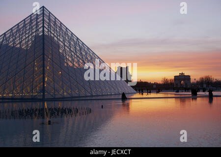 France, Paris, Louvre and glass pyramid, Stock Photo