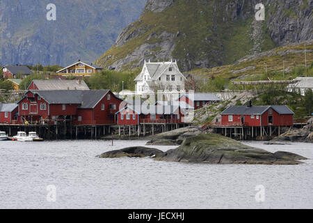 Rorbuer, traditional timber houses in the fishing village pure on the Lofoten island Moskenesoy, Stock Photo