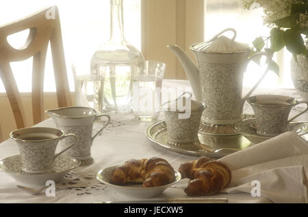 Coffee table, covered, porcelain, elegantly, table, table caps, white, dishes, china, silver tablet, tea service, cups, teapot, tea drinking, Teatime, tea, sugar bowl, lacteal pot, decanter, glasses, water, croissants, chair, sunlight, nobody, Stock Photo