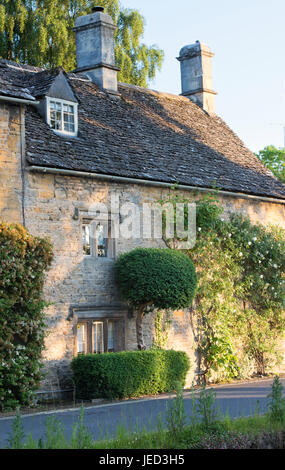 Upper Slaughter in the late evening june sunshine. Cotswolds, Gloucestershire, England Stock Photo