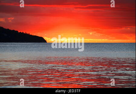 Fire in the sky over Mahe Stock Photo