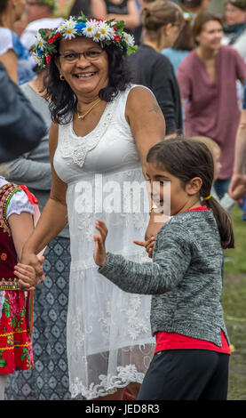 Malmö, Sweden. 23d June, 2017. Midsummer celebration in Folkets park with traditional Swedish dances, but also Bollywood music and dance. Tommy Lindholm/Alamy Live News Stock Photo