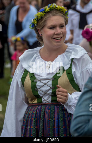 Malmö, Sweden. 23d June, 2017. Midsummer celebration in Folkets park with traditional Swedish dances, but also Bollywood music and dance. Tommy Lindholm/Alamy Live News Stock Photo