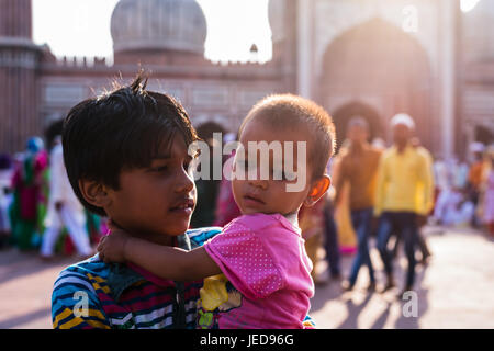 New Delhi, India. 23rd June, 2017. A little one with her brother at Jama Masjid came to celebrate Laylat-al-Kadr, last day of Ramadan. Credit: Swapan Banik/Alamy Live News Stock Photo