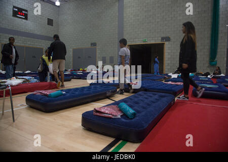 London UK 23rd June 2017 Residents Inside the refuge centre at Swiss Cottage. Residents of 800 homes moved out for up to four weeks after inspection by fire brigade following Grenfell Tower.Emergency accommodation is being sought for about 800 households from the five high-rise blocks on the Chalcots estate in Swiss Cottage in the borough of Camden. Credit: Thabo Jaiyesimi/Alamy Live News Stock Photo