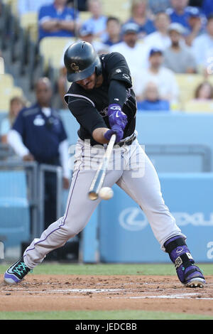 Los Angeles, CA, USA. 23rd June, 2017. Colorado Rockies third baseman Nolan Arenado (28) makes contact at the plate in the game between the Colorado Rockies and the Los Angeles Dodgers, Dodger Stadium in Los Angeles, CA. Photographer: Peter Joneleit. Credit: csm/Alamy Live News Stock Photo