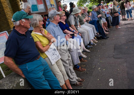 Upton Upon Severn, UK. 24th June, 2017. Crowds gather ready to watch the Mardi Gras style jazz parade on June 24th 2017. Credit: Jim Wood/Alamy Live News Stock Photo