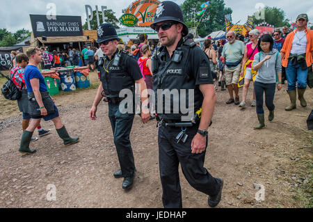 Glastonbury, Somerset, UK. 24th June, 2017. Police patrolling with a Taser - The 2017 Glastonbury Festival, Worthy Farm. Glastonbury, 24 June 2017 Credit: Guy Bell/Alamy Live News Stock Photo