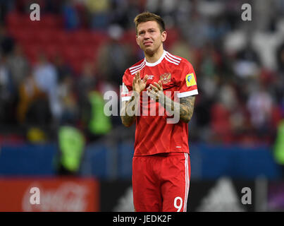 Kazan, Russia. 24th June, 2017. Russia's Fyodor Smolov leaves the field disappointed after his team's defeat against Mexico at the group stage match pitting Mexico against Russia at the Kazan Arena in Kazan, Russia, 24 June 2017. Photo: Marius Becker/dpa/Alamy Live News Stock Photo