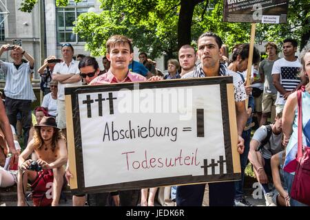 Munich, Germany. 24th June, 2017. ''Deportation= death penalty'' As part of a Bavaria-wide action, as well as other cities throughout Germany participating, well over 3,000 citizens, politicians, and refugee group volunteers in Munich organized a demonstration and subsequent march to the Staatskanzlei of Bavaria in protest of the resuming of refugee deportations into war zones. . Credit: ZUMA Press, Inc./Alamy Live News Stock Photo