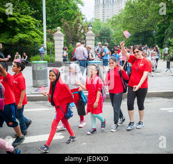 Students from PS 214 march in the annual Flag Day Parade in New York on Wednesday, June 14, 2017, starting at New York City Hall Park.  Flag Day was created by proclamation by President Woodrow Wilson on June 14, 1916 as a holiday honoring America's flag but it was not until 1949 when it became National Flag Day.  The holiday honors the 1777 Flag Resolution where the stars and stripes were officially adopted as the flag of the United States. (© Richard B. Levine) Stock Photo