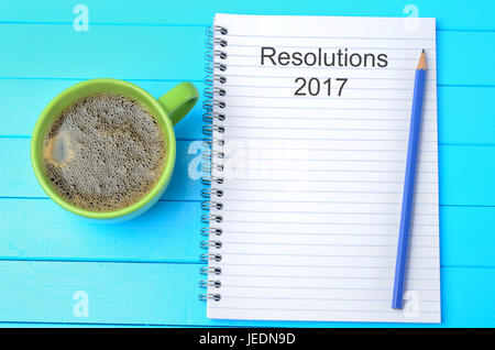 Resolutions 2017 year written on notebook closeup Stock Photo