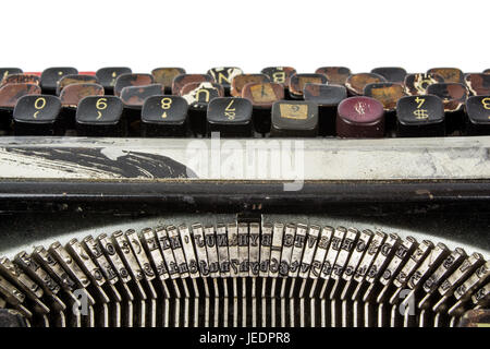 old and rusty dirty typewriter. viewed from the botton. They displayed all keyboard keys Stock Photo