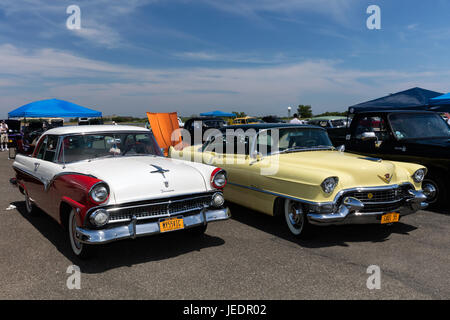A 1955 Ford Fairlane Victoria and 1955 Cadillac on display at the Antique Automobile Association of Brooklyn Annual Show at the Floyd Bennett Field Stock Photo
