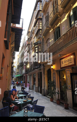 Spain, Malaga, tourist in a lane, Stock Photo