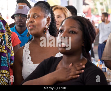 The family and friends of those missing and dead in  the fire that destroyed the 24-story Grenfell Tower in North Kensington, London on 14th June 2017.  The death toll officially at 75 but will no doubt rise to three figures. Stock Photo