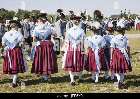 Germany, Bavaria, Burghausen, festival with traditional costumes, girl in traditional national costume, back view, Stock Photo