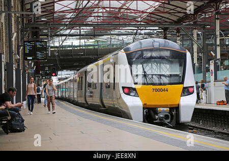 A new generation Siemens Series 700 Thameslink train leaves Farringdon Station, London, UK Stock Photo