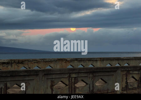 Moon setting at Mala pier in Lahaina on Maui. Stock Photo