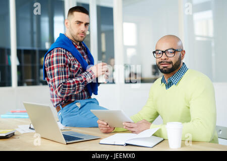 Modern designers working in office Stock Photo
