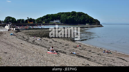 Clevedon pebble beach, North Somerset, with marine lake in background Stock Photo