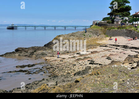 Clevedon pebble beach, North Somerset, with its pier in background Stock Photo