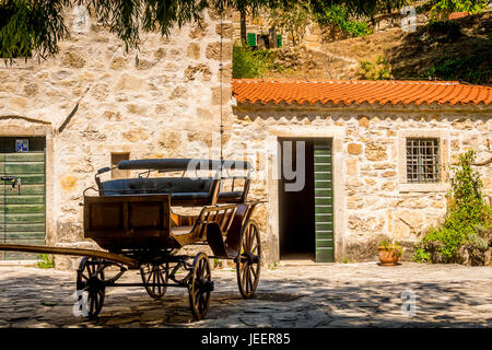 Historic buildings surrounding the Roski Slap waterfall at Krka National Park in Croatia. Stock Photo