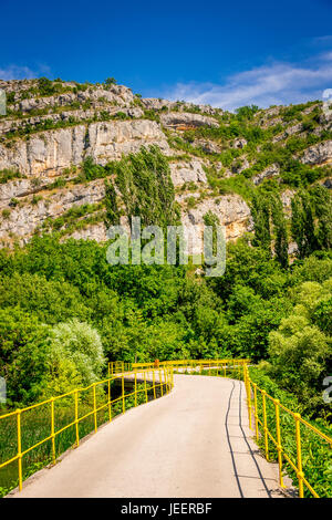 Bridge over the Krka River near Roski Slap in the Krka National Park, Croatia. Stock Photo