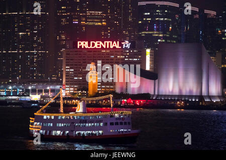 Horizontal view of Tsim Sha Tsui in Hong Kong lit up at night, China. Stock Photo