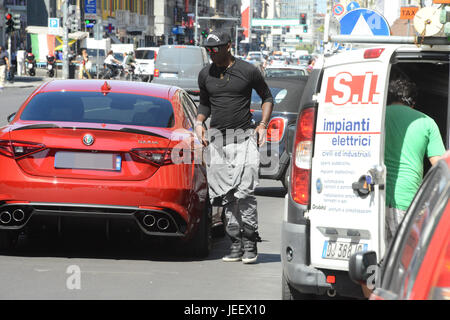 Mario Balotelli and his brother Enock Barwuah in downtown ...
