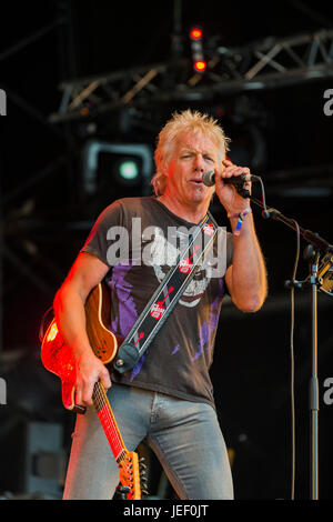 Dundrennan Scotland, UK - July 26, 2014: Simon Hough of Big Country, performing on the Summerisle stage at the Wickerman Festival Stock Photo