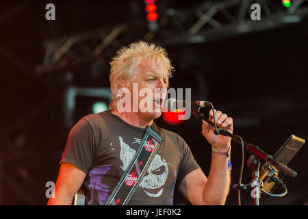 Dundrennan Scotland, UK - July 26, 2014: Simon Hough of Big Country, performing on the Summerisle stage at the Wickerman Festival Stock Photo