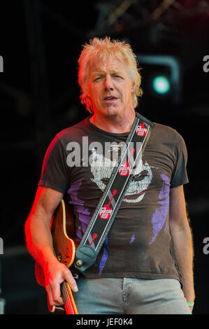 Dundrennan Scotland, UK - July 26, 2014: Simon Hough of Big Country, performing on the Summerisle stage at the Wickerman Festival Stock Photo