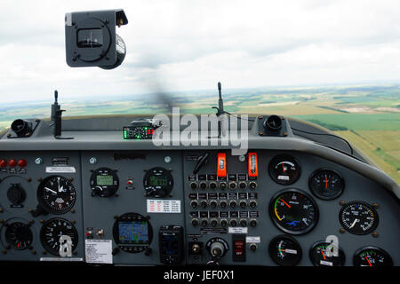 Pilots eye cockpit view of modern Turbo Falke motorglider showing instrument panel and gauges. Stock Photo