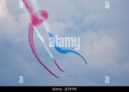 Flight show with aircrafts from the French Air Force,  Alpha Jets of the French Patrouille de France national display team. Stock Photo