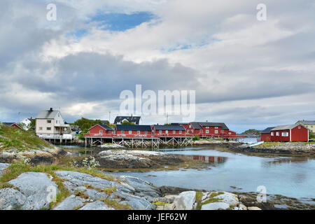 Henningsaer is a fishing village in the Norwegian local authority district Vagan which is on two small, offshore islands before the Lofoten island Aus Stock Photo