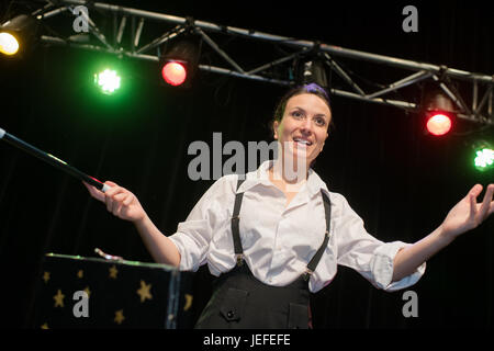 Close-up Of Magician In Suit Showing Trick With Magic Wand Stock Photo ...