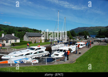 Scotland: boats navigating through Neptune's Staircase, eight locks on the Caledonian Canal at Fort Augustus mouth into Loch Ness UK  taken June 2017 Stock Photo