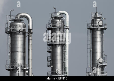 Cooling towers at an oil and gas refinery industrial plant. Stock Photo