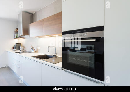 Modern kitchen interior with with built-in appliances Stock Photo