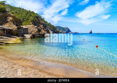 View of Cala Benirras beach with azure blue sea water, Ibiza island, Spain Stock Photo