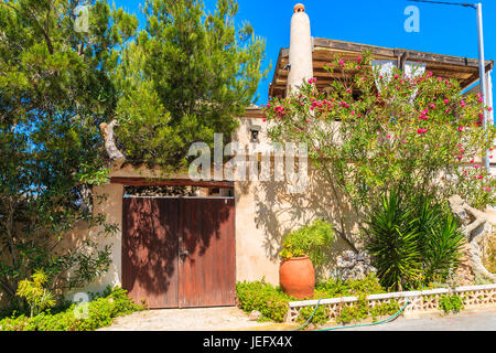 Typical Spanish style villa house on street in San Antonio town, Ibiza island, Spain Stock Photo